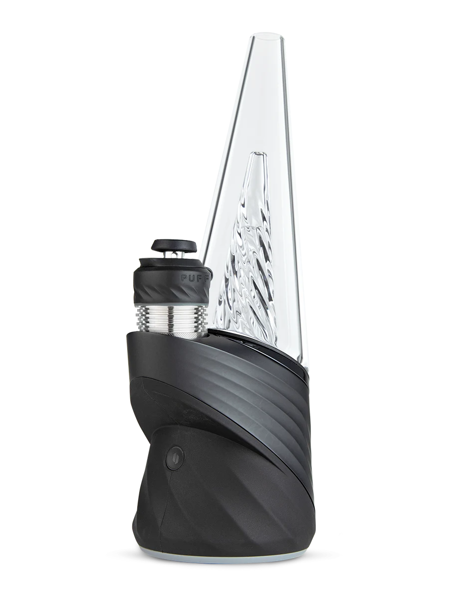 Puffco Peak Pro 3DXL in the Onyx finish, shown with purple editorial lighting
